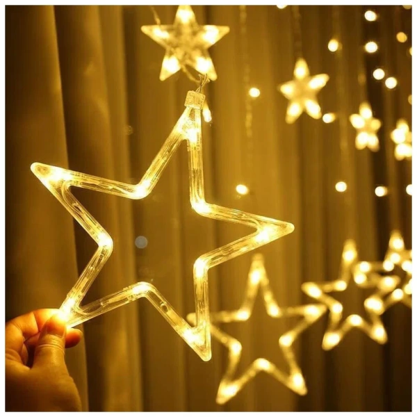 Электрогирлянда светодиодная Vegas Бахрома с звёздочками теплый 2 м